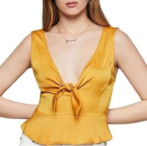 BCBGeneration gold peplum tank size small